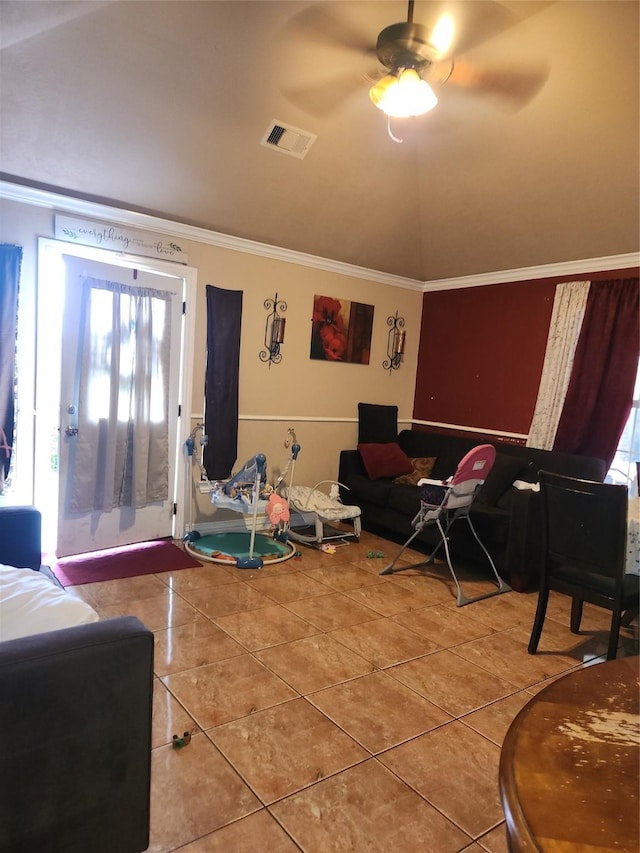 1902 July St, Houston, TX 77093 - tiled living area featuring crown molding and a ceiling fan