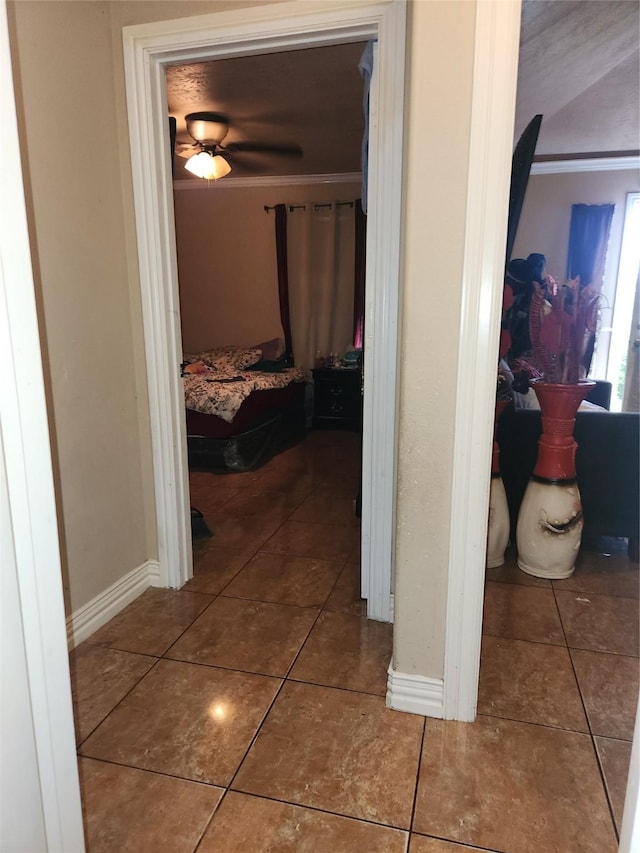 1902 July St, Houston, TX 77093 - hall featuring tile patterned floors and crown molding