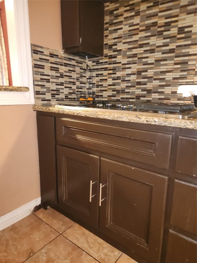 1902 July St, Houston, TX 77093 - detailed view of backsplash and stainless steel gas cooktop