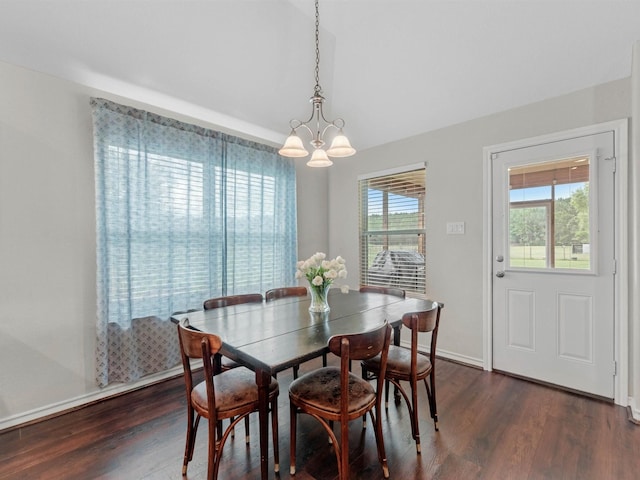 70 Rd 22705, Cleveland, TX 77327 - dining area with a chandelier, dark wood-type flooring, and vaulted ceiling