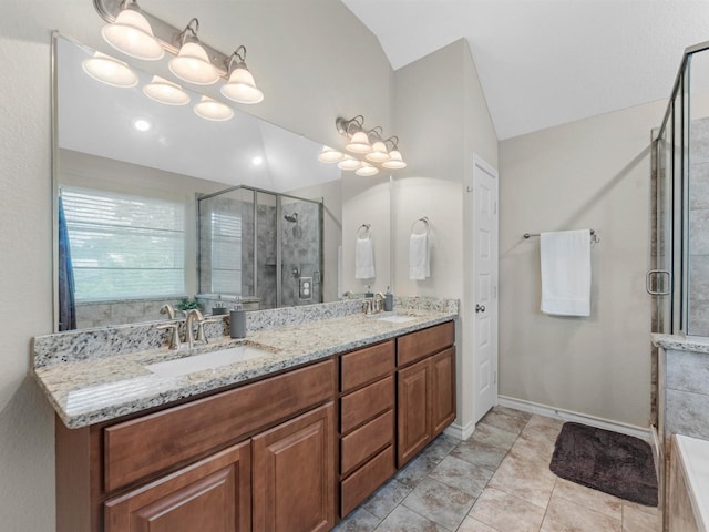 70 Rd 22705, Cleveland, TX 77327 - full bath with a shower stall, double vanity, lofted ceiling, and tile patterned flooring