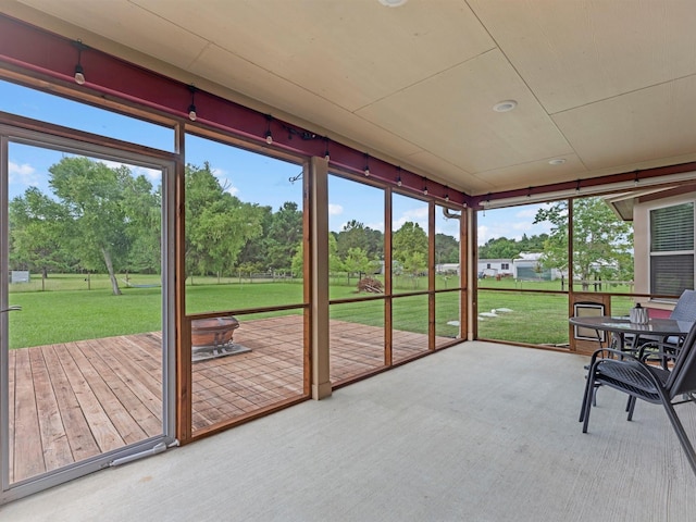70 Rd 22705, Cleveland, TX 77327 - sunroom with view of wooded area