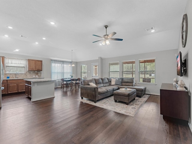 70 Rd 22705, Cleveland, TX 77327 - living area with a ceiling fan, dark wood finished floors, vaulted ceiling, and recessed lighting
