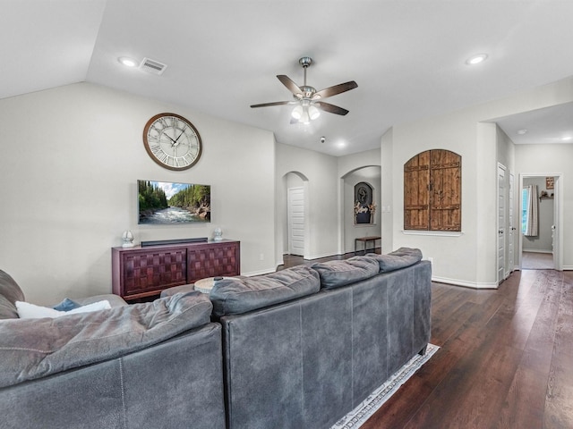 70 Rd 22705, Cleveland, TX 77327 - living area featuring ceiling fan, dark wood-style flooring, arched walkways, vaulted ceiling, and recessed lighting
