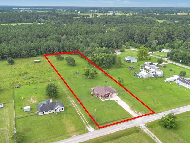 70 Rd 22705, Cleveland, TX 77327 - aerial overview of property's location with a heavily wooded area and property parcel outlined