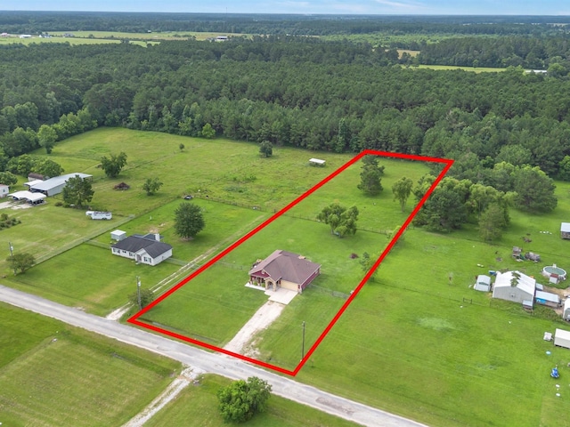 70 Rd 22705, Cleveland, TX 77327 - aerial view of property's location featuring a heavily wooded area and property parcel outlined