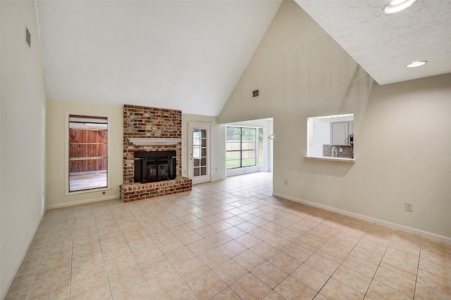 3507 Dawnwood Dr, Spring, TX 77380 - unfurnished living room with high vaulted ceiling, light tile patterned floors, and a brick fireplace