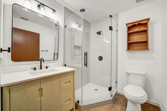 3507 Dawnwood Dr, Spring, TX 77380 - full bath featuring vanity, wood finished floors, and a stall shower