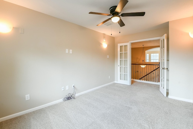 14307 Baron Creek Ln, Houston, TX 77044 - carpeted spare room with french doors and ceiling fan