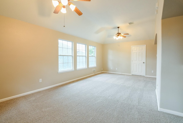 14307 Baron Creek Ln, Houston, TX 77044 - spare room featuring a ceiling fan, light colored carpet, and lofted ceiling