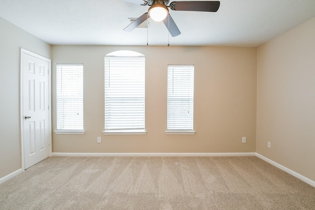 14307 Baron Creek Ln, Houston, TX 77044 - unfurnished room featuring light carpet, ceiling fan, and healthy amount of natural light