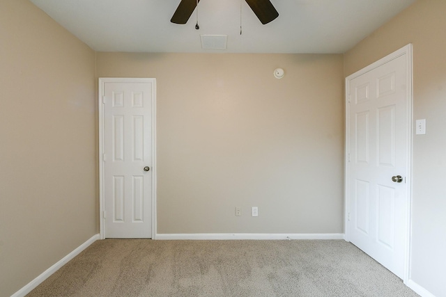 14307 Baron Creek Ln, Houston, TX 77044 - carpeted empty room with a ceiling fan and a smoke detector