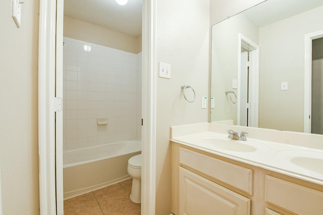 14307 Baron Creek Ln, Houston, TX 77044 - bathroom with double vanity, tile patterned floors, and shower / bath combination