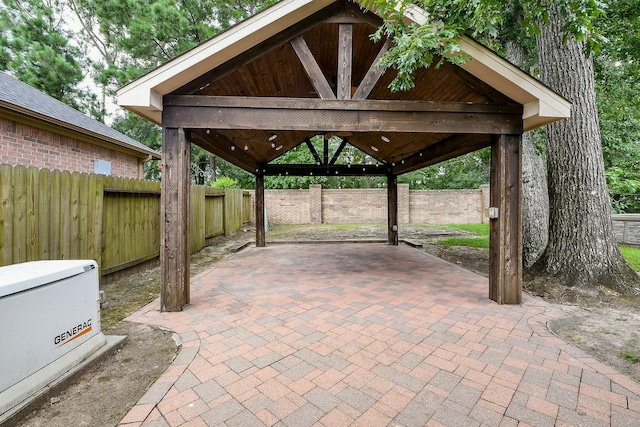 14307 Baron Creek Ln, Houston, TX 77044 - fenced backyard featuring a gazebo and a patio area