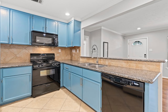 5110 Verdome Ln, Houston, TX 77092 - kitchen featuring black appliances, blue cabinetry, a peninsula, crown molding, and recessed lighting