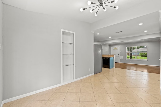 5110 Verdome Ln, Houston, TX 77092 - unfurnished living room featuring recessed lighting, light tile patterned flooring, and a chandelier