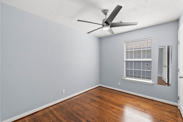 5110 Verdome Ln, Houston, TX 77092 - empty room with ceiling fan, wood finished floors, and a textured ceiling