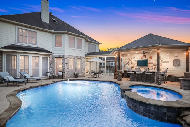 4502 Buffalo Lake Ct, Richmond, TX 77406 - view of pool with ceiling fan, a patio, and a pool with connected hot tub