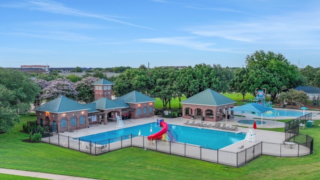 4502 Buffalo Lake Ct, Richmond, TX 77406 - community pool with a patio area and view of scattered trees