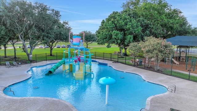 4502 Buffalo Lake Ct, Richmond, TX 77406 - community pool with a water play area and a patio