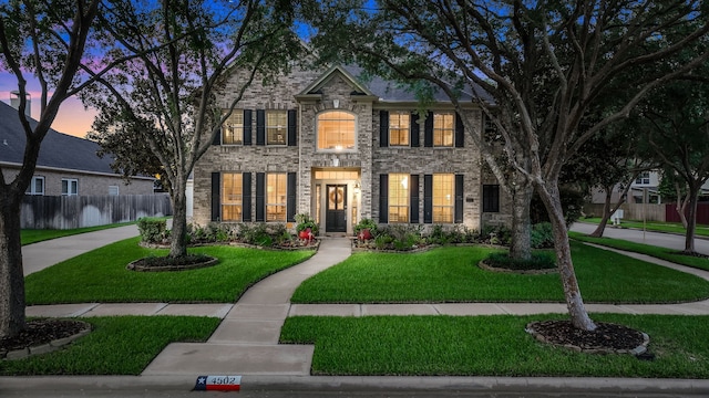 4502 Buffalo Lake Ct, Richmond, TX 77406 - colonial home featuring stone siding and brick siding