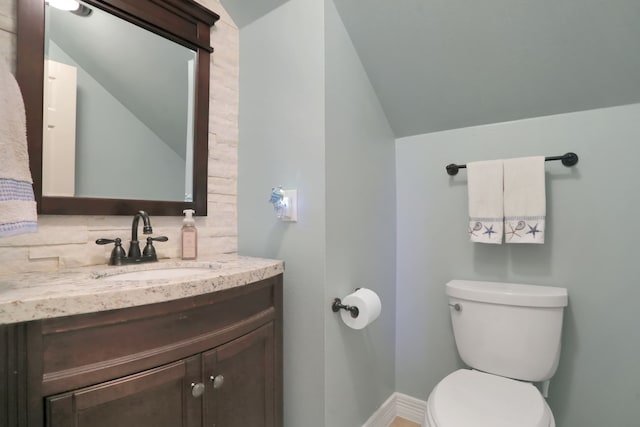 4502 Buffalo Lake Ct, Richmond, TX 77406 - half bathroom featuring vanity and lofted ceiling