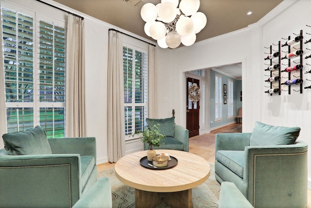 4502 Buffalo Lake Ct, Richmond, TX 77406 - living area with a chandelier, light wood-style flooring, and ornamental molding