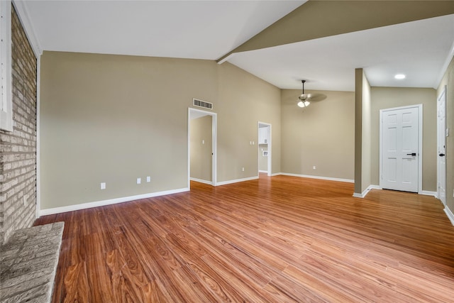 6401 Deihl Rd Unit 901, Houston, TX 77092 - unfurnished living room with lofted ceiling, a ceiling fan, and light wood finished floors