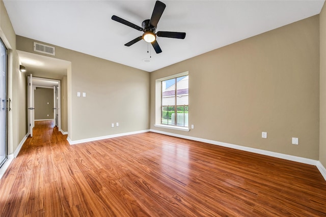 6401 Deihl Rd Unit 901, Houston, TX 77092 - empty room featuring light wood-style floors and ceiling fan