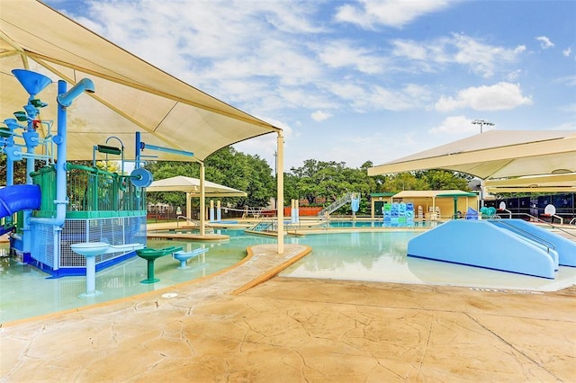 5920 Lake St, Houston, TX 77005 - community pool featuring a patio and a water play area