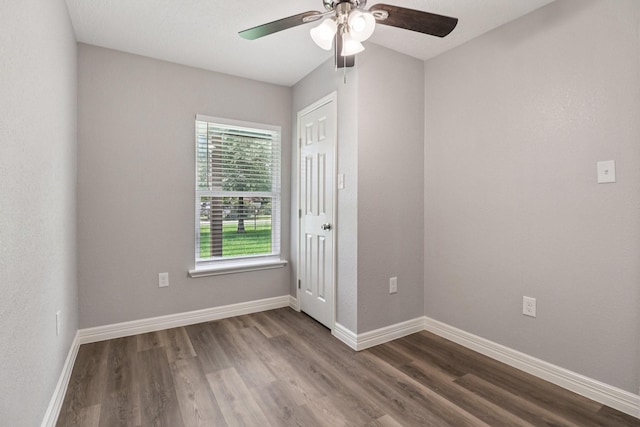 16820 Laurelwood Dr, Channelview, TX 77530 - unfurnished room with ceiling fan and dark wood-style flooring