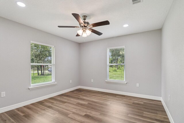16820 Laurelwood Dr, Channelview, TX 77530 - empty room featuring ceiling fan, wood finished floors, and recessed lighting