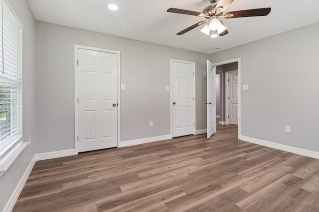 16820 Laurelwood Dr, Channelview, TX 77530 - unfurnished bedroom featuring wood finished floors, a ceiling fan, and recessed lighting