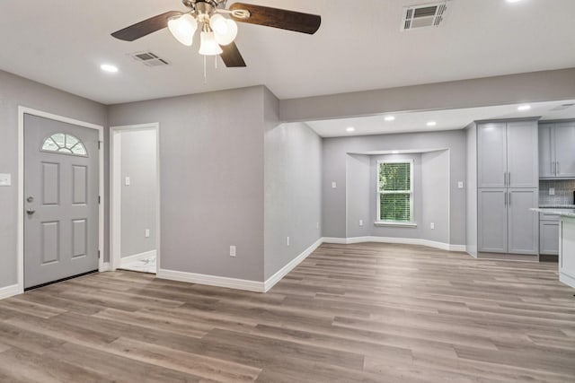 16820 Laurelwood Dr, Channelview, TX 77530 - foyer with ceiling fan, recessed lighting, and light wood finished floors
