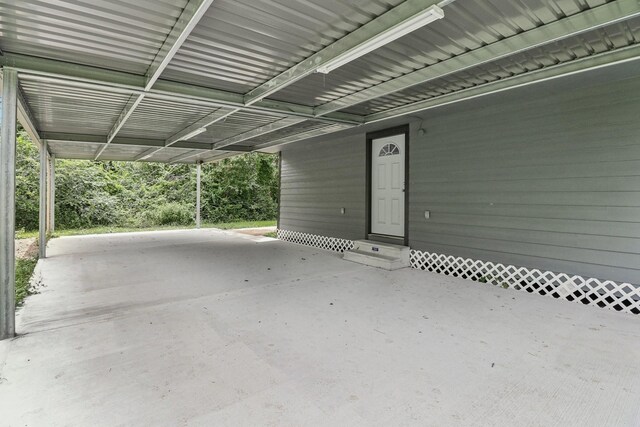 16820 Laurelwood Dr, Channelview, TX 77530 - view of patio with entry steps and a carport