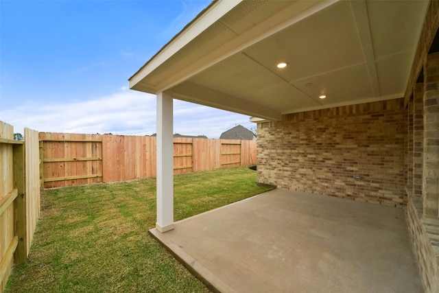 19172 Cedar Lennox Cir, Magnolia, TX 77355 - fenced backyard featuring a patio