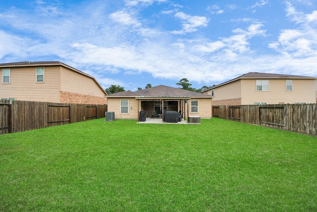 38327 Miranda Ln, Magnolia, TX 77355 - back of house with a patio and a fenced backyard