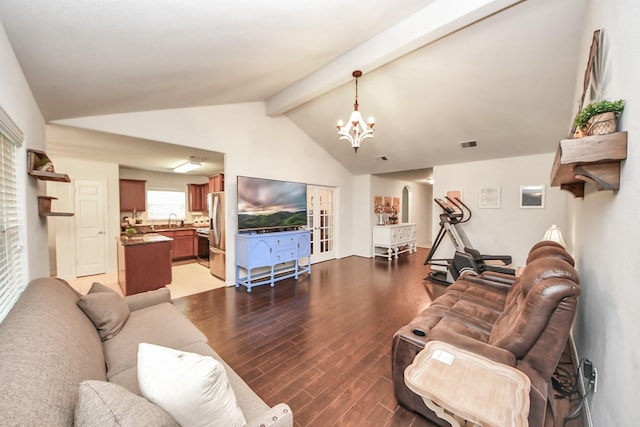 38327 Miranda Ln, Magnolia, TX 77355 - living room with wood finished floors and a chandelier