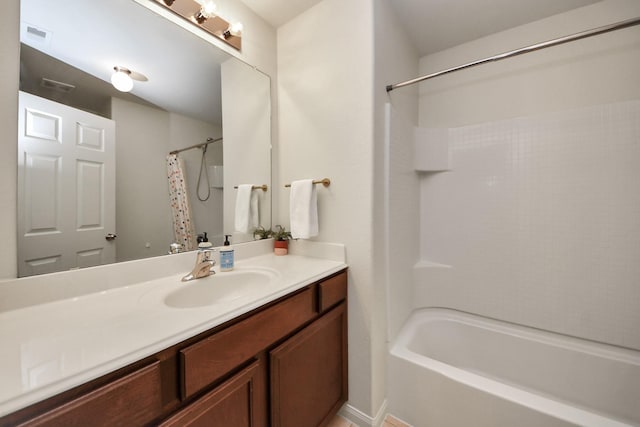 38327 Miranda Ln, Magnolia, TX 77355 - bathroom featuring vanity and shower / bath combination with curtain