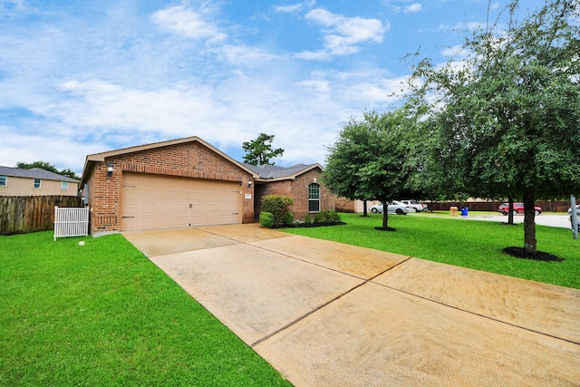 38327 Miranda Ln, Magnolia, TX 77355 - ranch-style home featuring brick siding, concrete driveway, and an attached garage