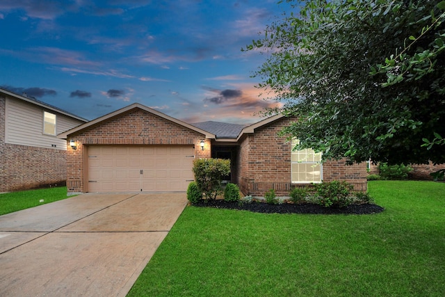 38327 Miranda Ln, Magnolia, TX 77355 - ranch-style house featuring brick siding, a lawn, an attached garage, and driveway