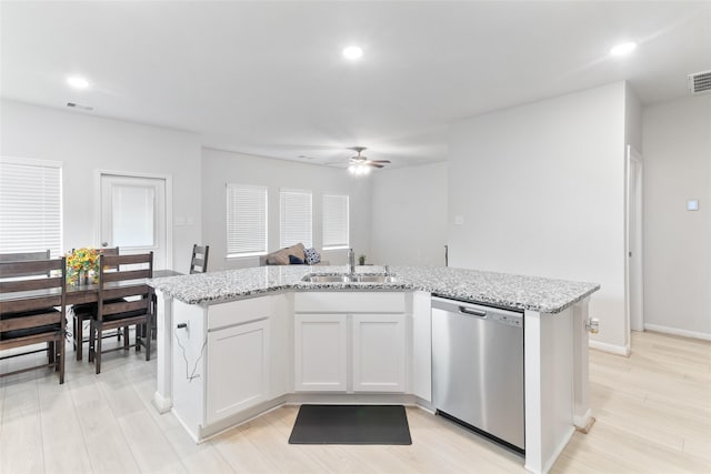 214 Water Grass Trl, Clute, TX 77531 - kitchen featuring dishwasher, a ceiling fan, recessed lighting, light stone countertops, and light wood finished floors