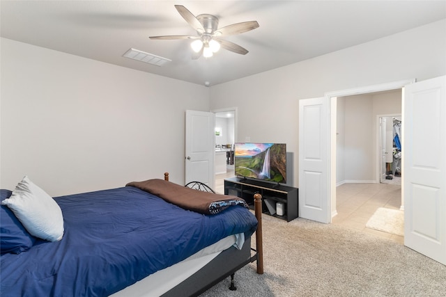 214 Water Grass Trl, Clute, TX 77531 - bedroom with light colored carpet and a ceiling fan