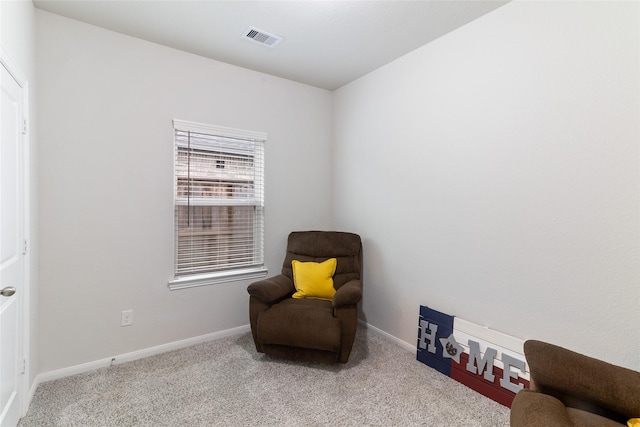 214 Water Grass Trl, Clute, TX 77531 - living area with carpet floors and baseboards