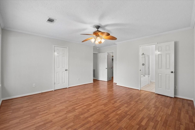 1726 Kemah Oaks Dr, Kemah, TX 77565 - unfurnished bedroom with light wood-style floors, a textured ceiling, ornamental molding, a ceiling fan, and ensuite bathroom