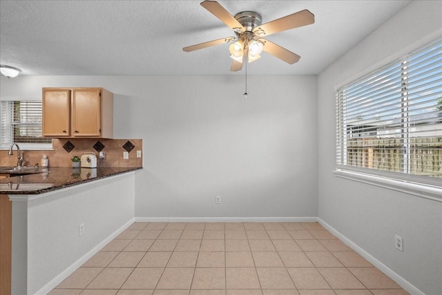 1726 Kemah Oaks Dr, Kemah, TX 77565 - unfurnished dining area featuring ceiling fan and a textured ceiling
