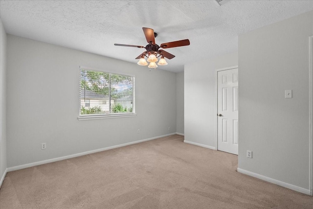 1726 Kemah Oaks Dr, Kemah, TX 77565 - unfurnished room featuring carpet, ceiling fan, and a textured ceiling