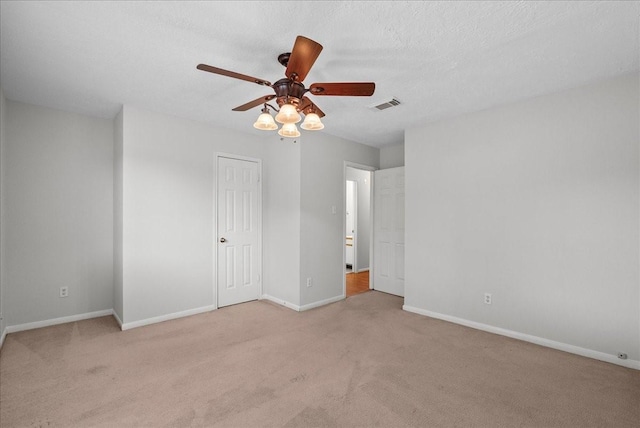 1726 Kemah Oaks Dr, Kemah, TX 77565 - unfurnished bedroom with light colored carpet and a ceiling fan