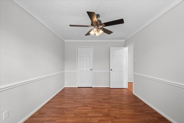 1726 Kemah Oaks Dr, Kemah, TX 77565 - unfurnished bedroom featuring wood finished floors, ornamental molding, a textured ceiling, and ceiling fan