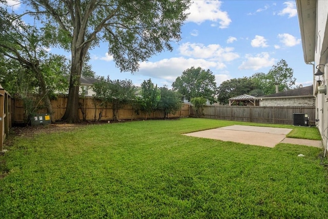 1726 Kemah Oaks Dr, Kemah, TX 77565 - fenced backyard with a patio area